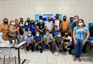 Equipe Lourinho em palestra de conscientização sobre o câncer de próstata.